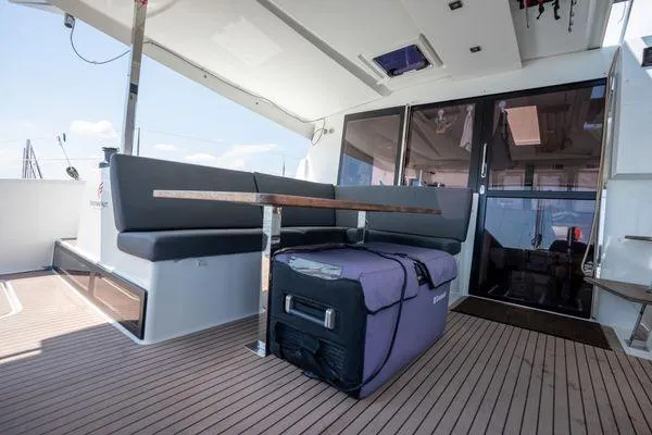 Slide: The Image of 2023 Fountaine Pajot Isla 40 yacht deck with seating and storage. - 49