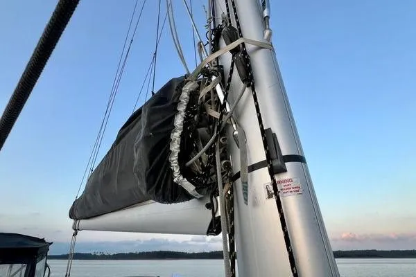 Slide: The Image of 2023 Fountaine Pajot Isla 40 sailboat mast and rigging against a serene sky. - 68