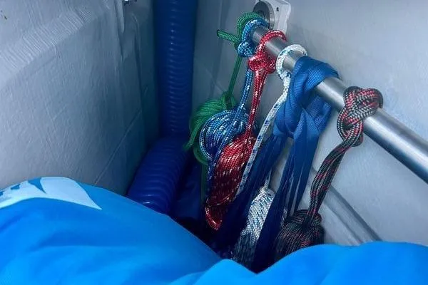 Slide: The Image of Colorful ropes and equipment stored on a Fountaine Pajot Isla 40, 2023 model. - 75