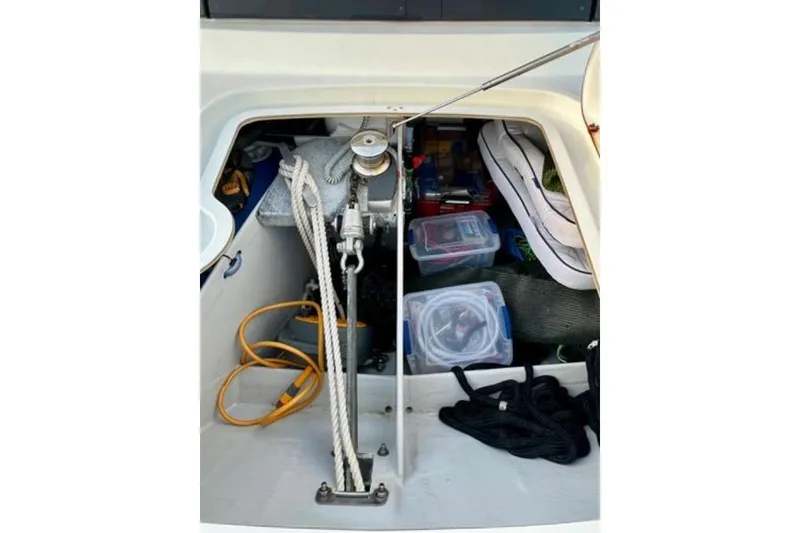 Slide: The Image of Storage compartment of 2023 Fountaine Pajot Isla 40 catamaran with ropes and equipment. - 78