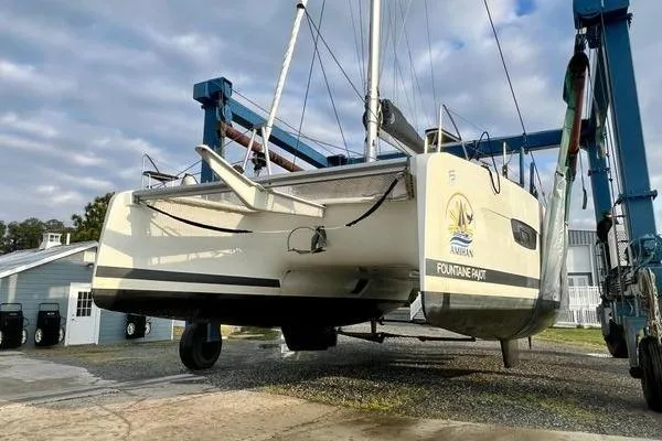 Slide: The Image of 2023 Fountaine Pajot Isla 40 catamaran on a lift, ready for launch. - 80