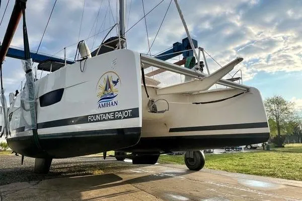 Slide: The Image of 2023 Fountaine Pajot Isla 40 catamaran on land, showcasing sleek design and modern features. - 81