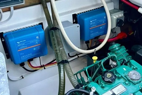 Slide: The Image of Engine room of 2023 Fountaine Pajot Isla 40 with electrical components and wiring. - 87