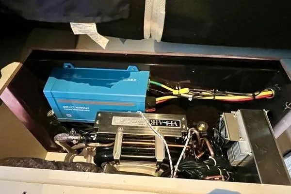 Slide: The Image of Electrical components inside 2023 Fountaine Pajot Isla 40 yacht, featuring wiring and equipment. - 88