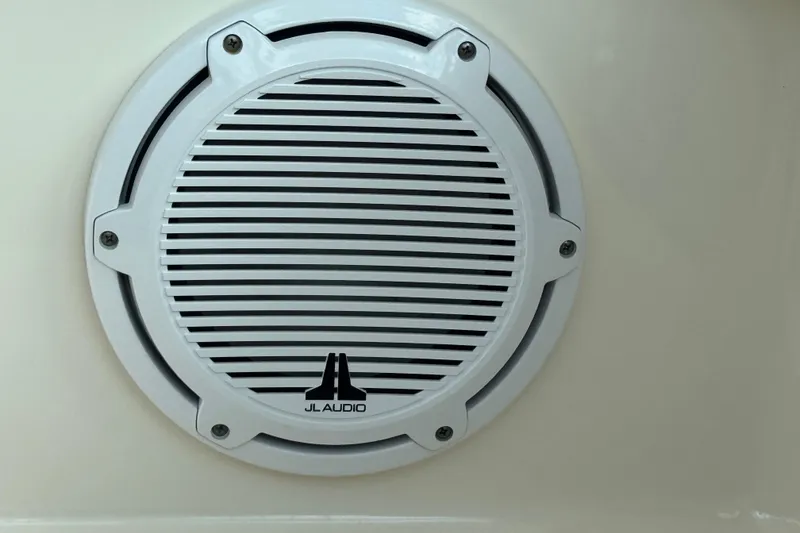 Slide: The Image of JL Audio speaker on 2014 Pursuit OS 345 Offshore boat. - 57