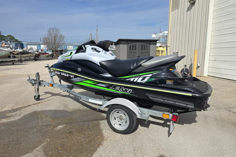 Slide: The Image of 2016 Kawasaki Jetski Ultra 310X on trailer, parked outdoors. - 5