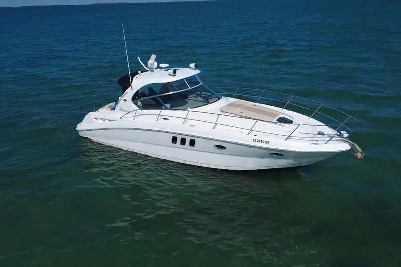 The Image of 2008 Sea Ray 380 Sundancer yacht cruising on open water. - 0