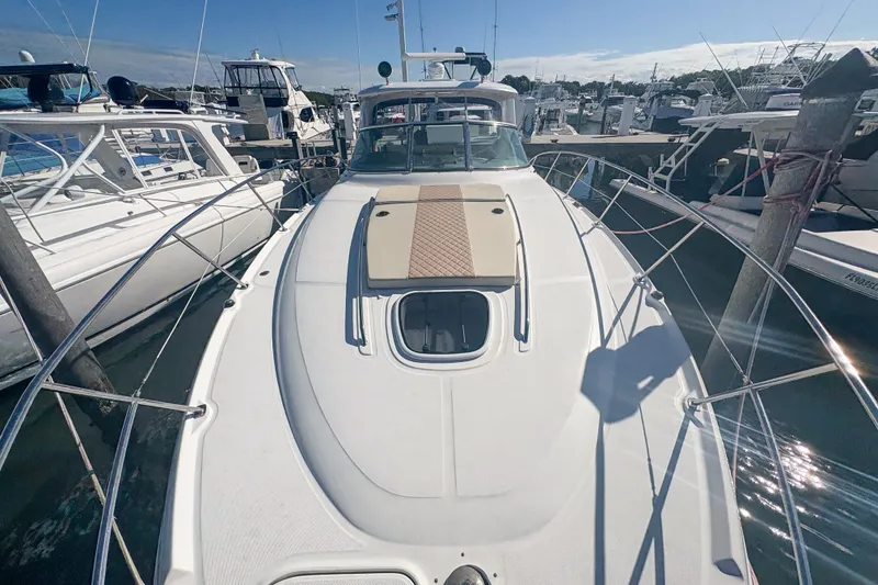 Slide: The Image of 2008 Sea Ray 380 Sundancer yacht docked at marina, sunny day, clear sky. - 26
