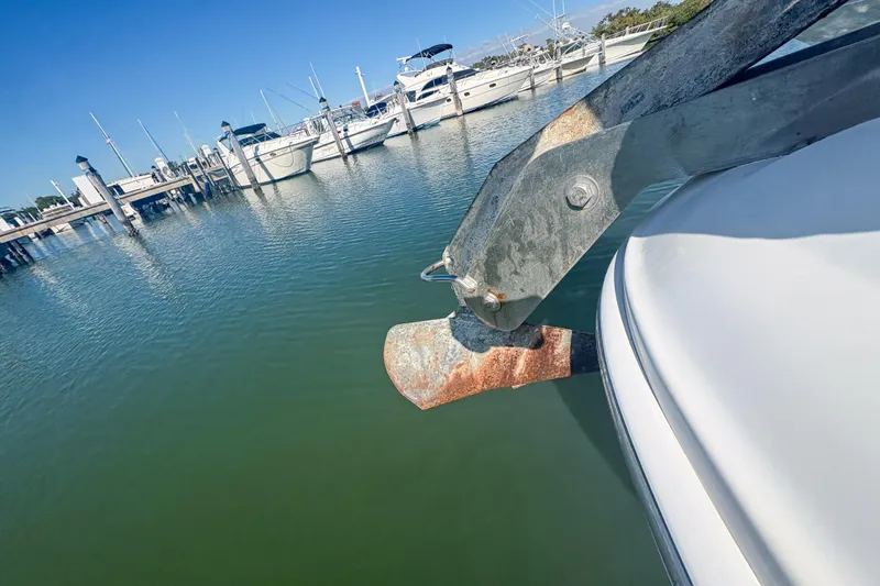 Slide: The Image of Docked Sea Ray 380 Sundancer boat with visible anchor, 2008 model, in a marina. - 32
