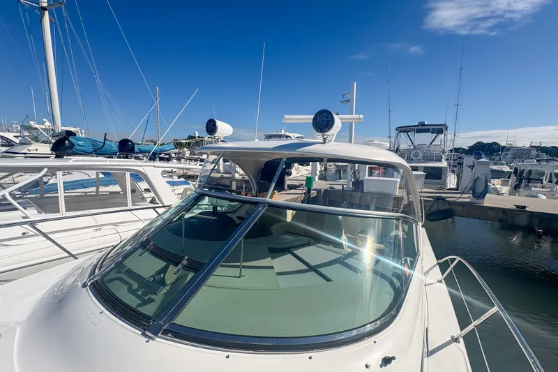 Slide: The Image of 2008 Sea Ray 380 Sundancer docked in marina under sunny skies. - 34