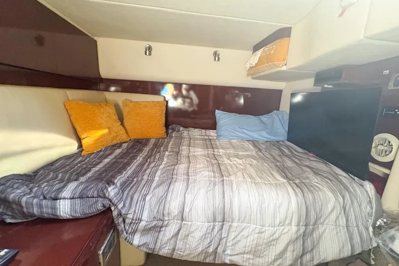 Slide: The Image of Interior cabin of 2008 Sea Ray 380 Sundancer with cozy bed and pillows. - 43