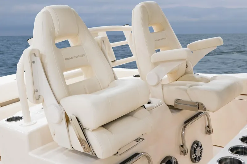 Slide: The Image of Manufacturer Provided Image: Luxury seating on 2025 Grady-White Canyon 306 boat, ocean backdrop. - 7