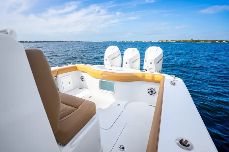 Slide: The Image of 2026 Yellowfin 36 Offshore boat on open sea. - 12