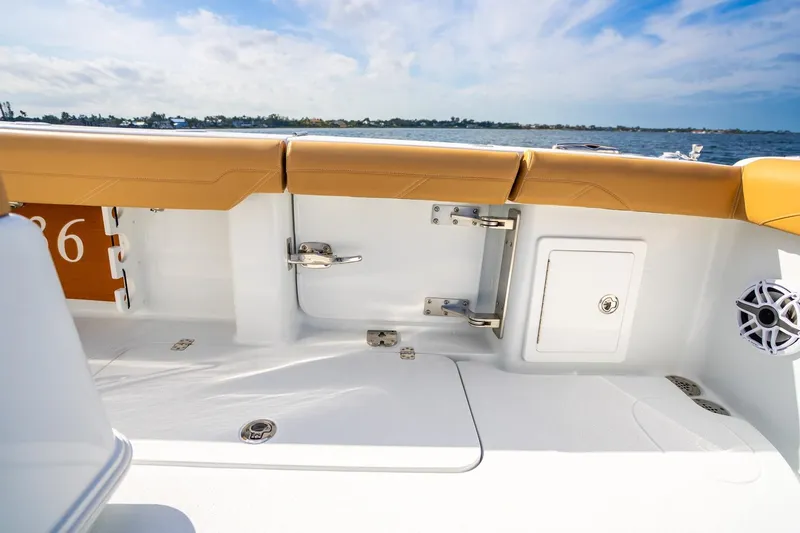 Slide: The Image of Interior of Yellowfin 36 Offshore 2026 with seating and storage area. - 14