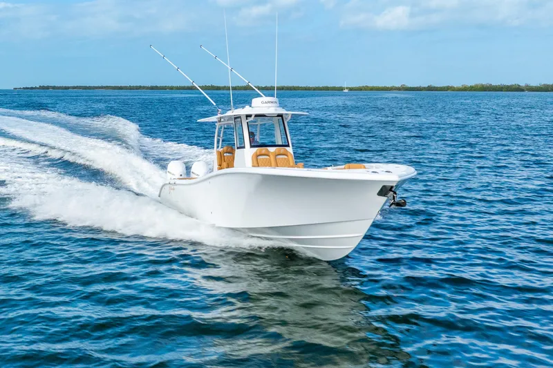 Slide: The Image of 2026 Yellowfin 36 Offshore boat cruising on open sea. - 3