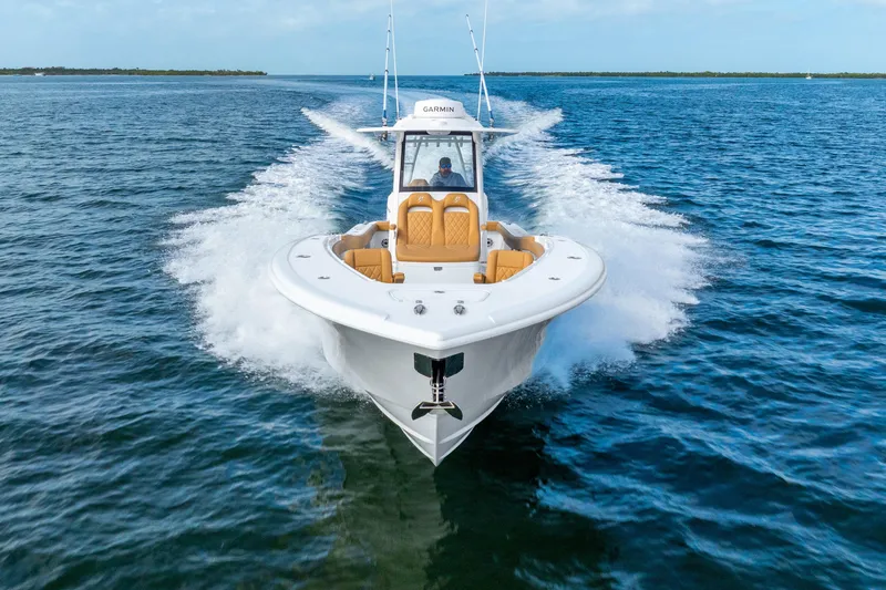 Slide: The Image of 2026 Yellowfin 36 Offshore boat cruising on open water. - 4