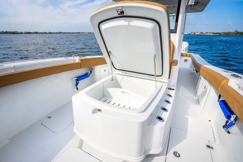 Slide: The Image of 2026 Yellowfin 36 Offshore boat with open storage on the water. - 6