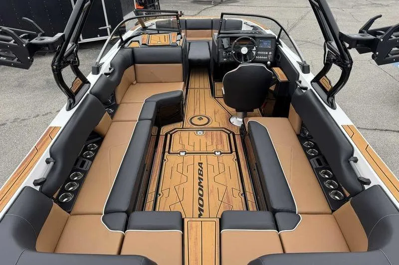 Slide: The Image of 2026 Moomba Tykon boat interior with sleek seating and modern dashboard design. - 14