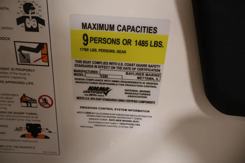 Slide: The Image of Bayliner V20i 2026 capacity label, maximum 9 persons or 1485 lbs, safety compliance. - 23