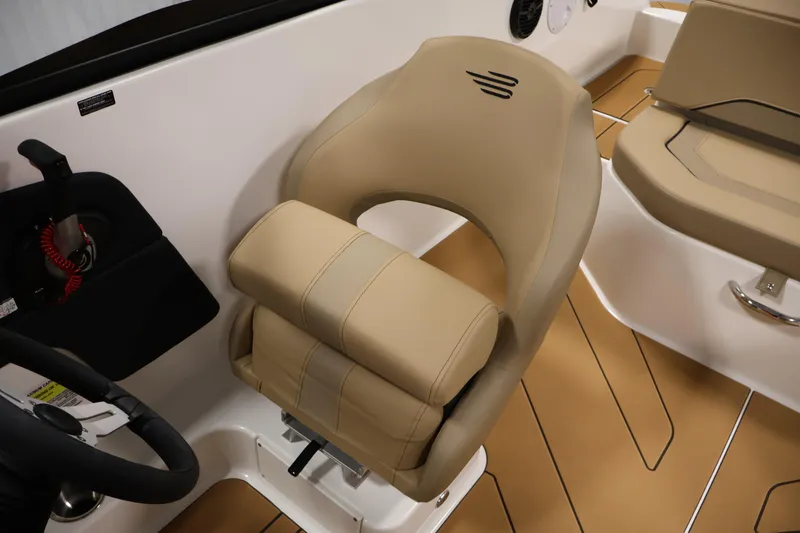 Slide: The Image of Luxurious seating in 2026 Bayliner V20i boat with beige upholstery and modern design. - 25