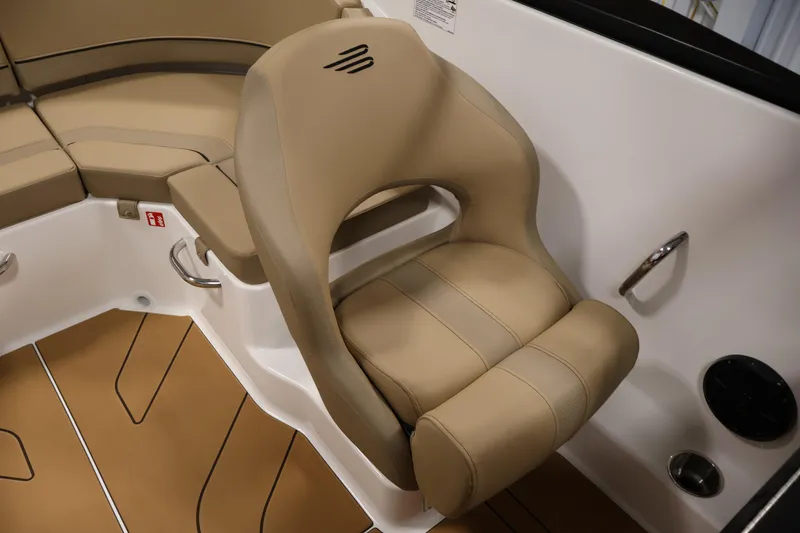 Slide: The Image of 2026 Bayliner V20i boat interior with beige seating and modern design. - 27
