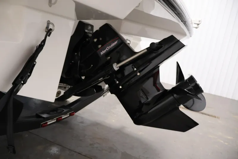 Slide: The Image of 2026 Bayliner V20i boat with MerCruiser engine, close-up of propeller and stern drive. - 34