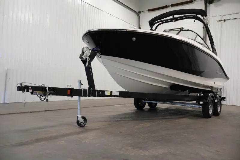 Slide: The Image of 2026 Bayliner V20i boat on trailer in indoor storage facility. - 36