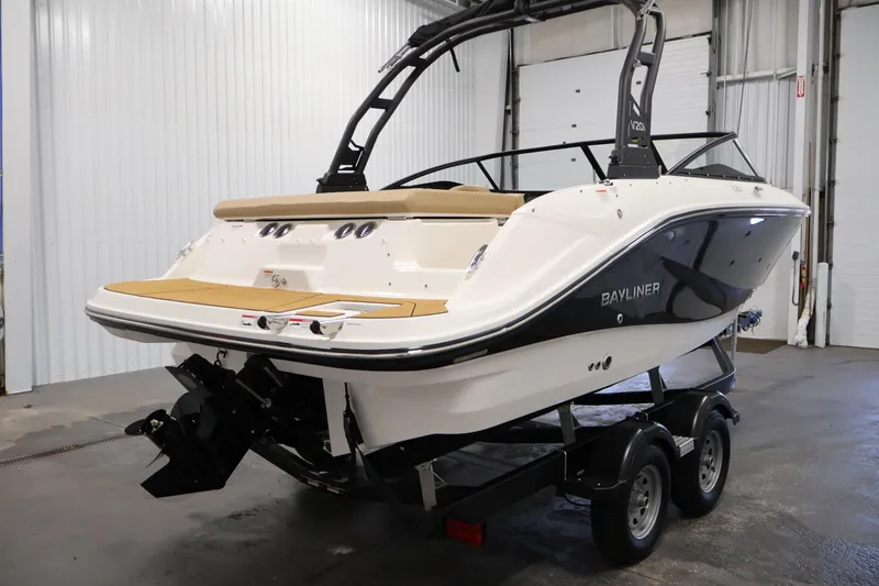 Slide: The Image of 2026 Bayliner V20i boat on trailer in indoor storage facility. - 4