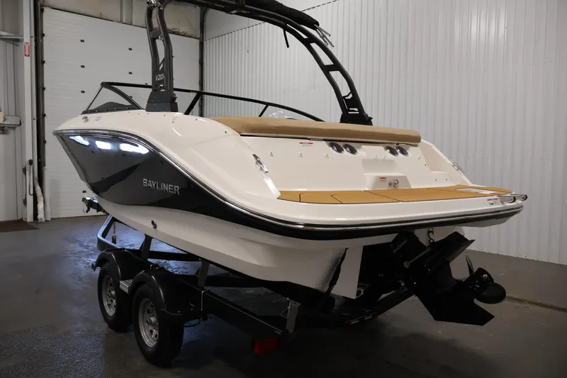 Slide: The Image of 2026 Bayliner V20i boat on trailer in indoor storage facility. - 6