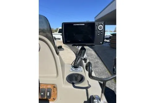 Slide: The Image of 2002 Tracker Pro Angler V 16 boat dashboard with fish finder display. - 4