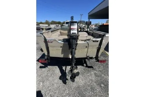 Slide: The Image of 2002 Tracker Pro Angler V 16 boat, rear view, parked outdoors. - 6