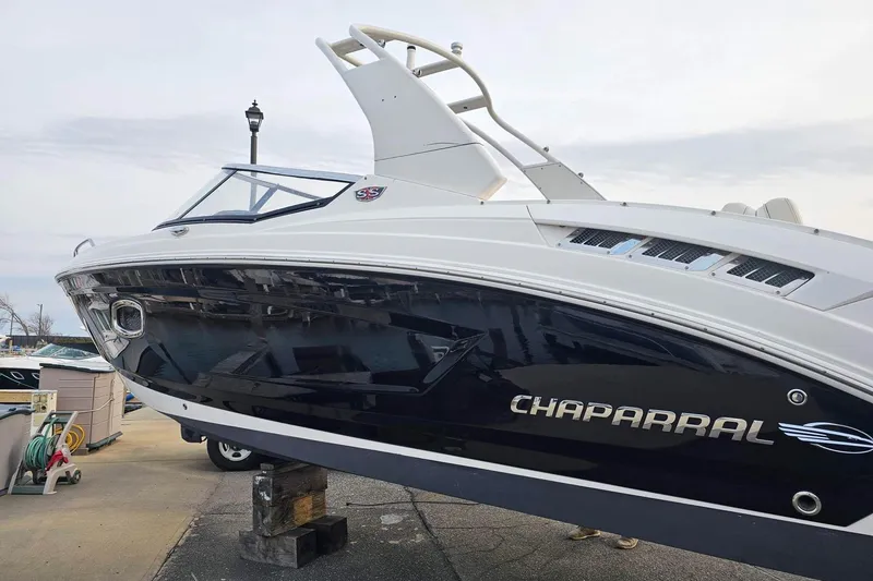 Slide: The Image of 2017 Chaparral 257 SSX boat on display, showcasing sleek design and modern features. - 0