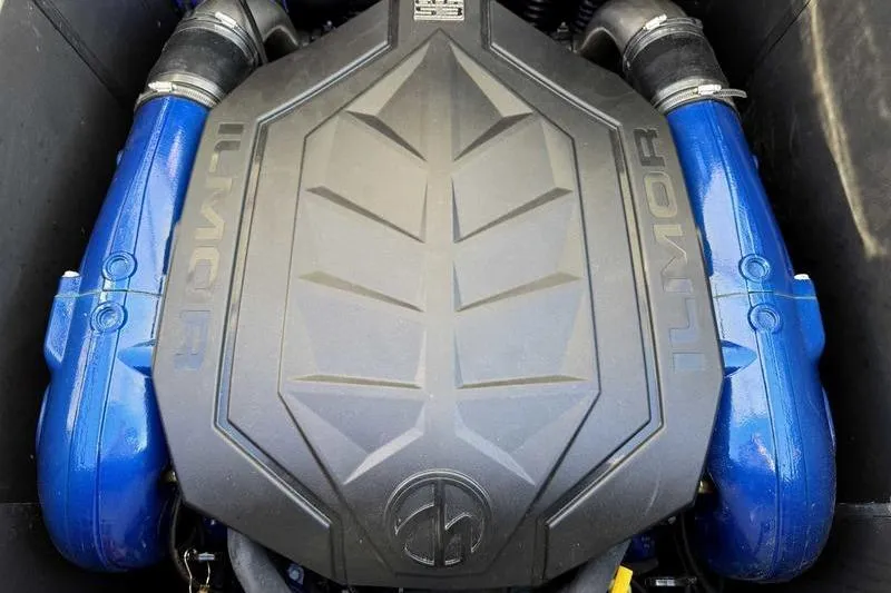 Slide: The Image of Ilmor engine in 2025 MasterCraft XT23 boat, featuring blue components. - 4