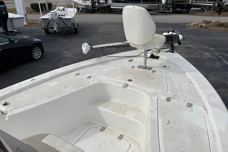 Slide: The Image of 2018 Sea Pro 208 Bay boat deck with seating and trolling motor. - 5