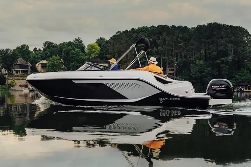 The Image of Manufacturer Provided Image: 2025 Bayliner D22 boat cruising on a calm lake with scenic forest background. - 0