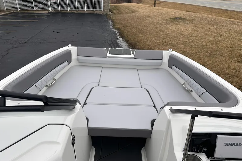Slide: The Image of 2026 Bayliner D22 boat interior with spacious seating and modern design. - 16
