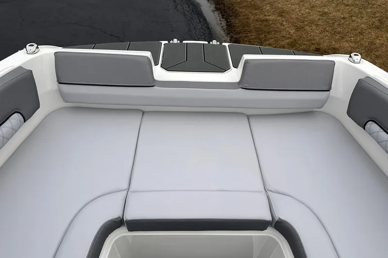 Slide: The Image of 2026 Bayliner D22 boat interior with cushioned seating and sleek design. - 17