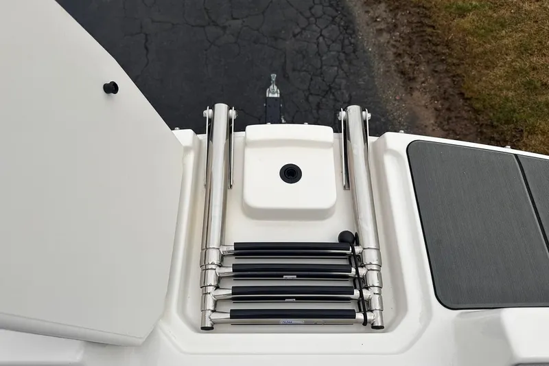 Slide: The Image of 2026 Bayliner D22 boat ladder and deck detail, showcasing sleek design and functionality. - 20
