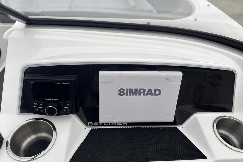 Slide: The Image of 2026 Bayliner D22 dashboard with Simrad navigation and Rockford Fosgate audio system. - 29