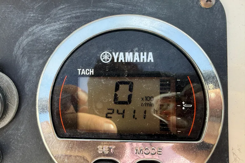 Slide: The Image of Yamaha tachometer on 2026 Robalo R277 Dual Console, displaying 241.1 hours. - 12