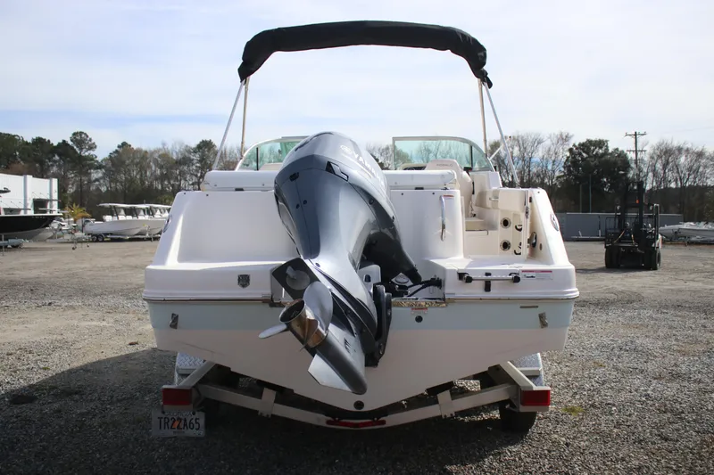 Slide: The Image of 2026 Robalo R277 Dual Console boat with outboard motor, rear view on trailer. - 5