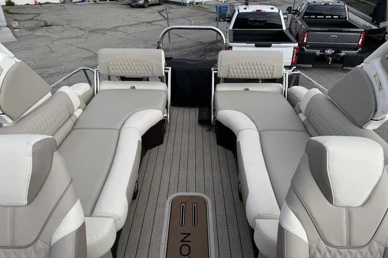 Slide: The Image of Luxurious interior of 2026 Avalon 2585 27-3 Excalibur LTD QLS boat with modern dashboard. - 14