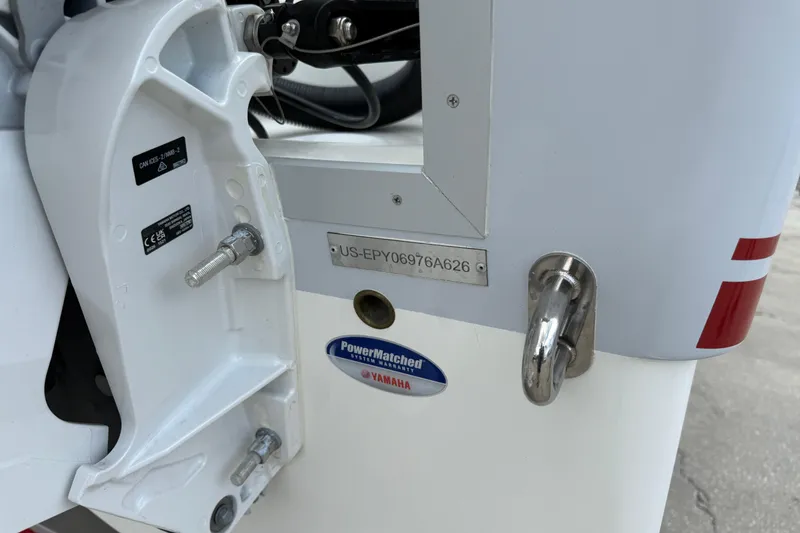 Slide: The Image of 2026 World Cat 230 SD boat transom with Yamaha PowerMatched system warranty sticker. - 22