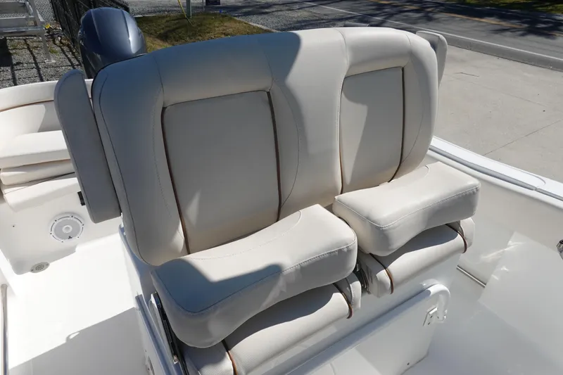 Slide: The Image of 2022 Sea Hunt Ultra 234 boat with comfortable dual seating arrangement. - 16
