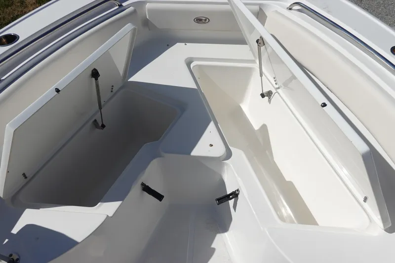 Slide: The Image of 2022 Sea Hunt Ultra 234 boat storage compartments, open and spacious design. - 30