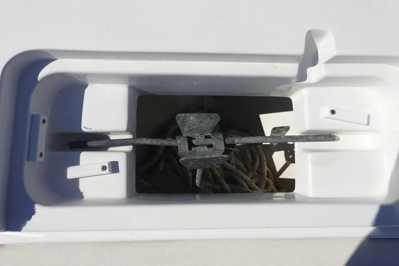Slide: The Image of Anchor storage compartment on 2022 Sea Hunt Ultra 234 boat. - 34