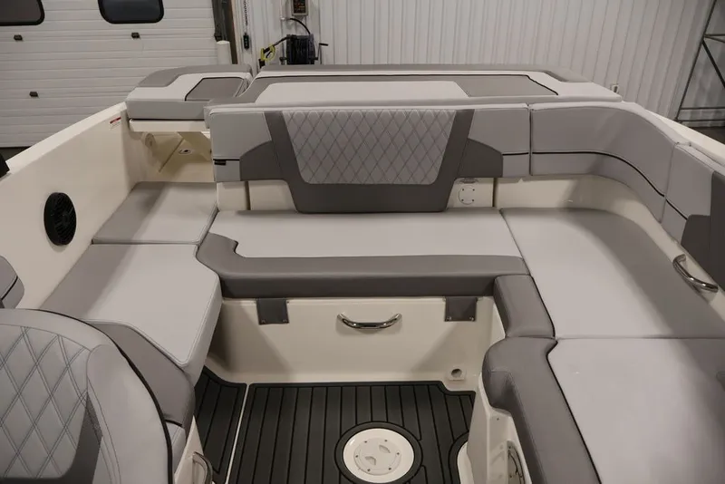 Slide: The Image of 2026 Bayliner VR6 Bowrider I/O interior with gray seating and modern design. - 29
