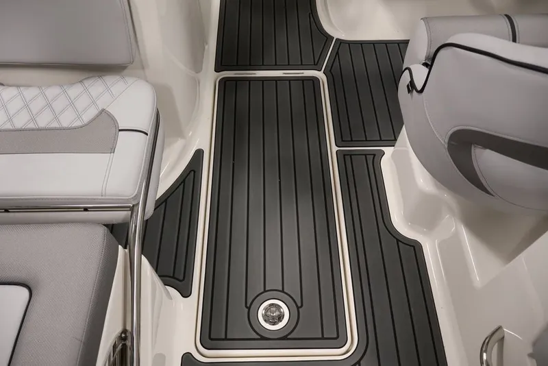 Slide: The Image of 2026 Bayliner VR6 Bowrider I/O interior with sleek seating and modern flooring design. - 27