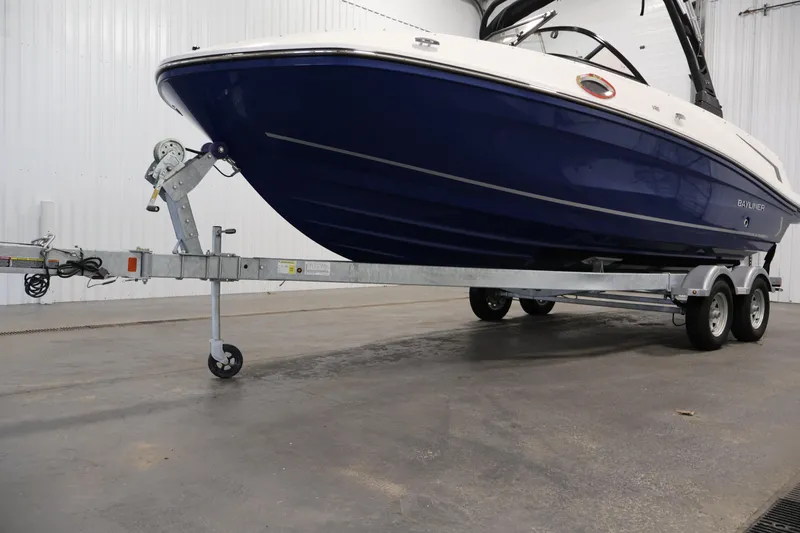 Slide: The Image of 2026 Bayliner VR6 Bowrider I/O on trailer in indoor storage facility. - 39