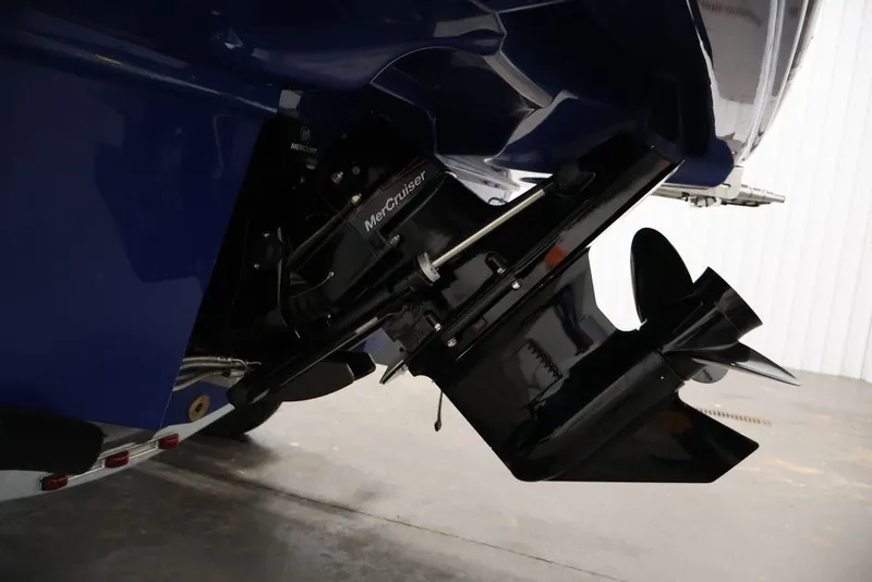 Slide: The Image of 2026 Bayliner VR6 Bowrider I/O with MerCruiser engine, close-up of propeller and drive. - 34